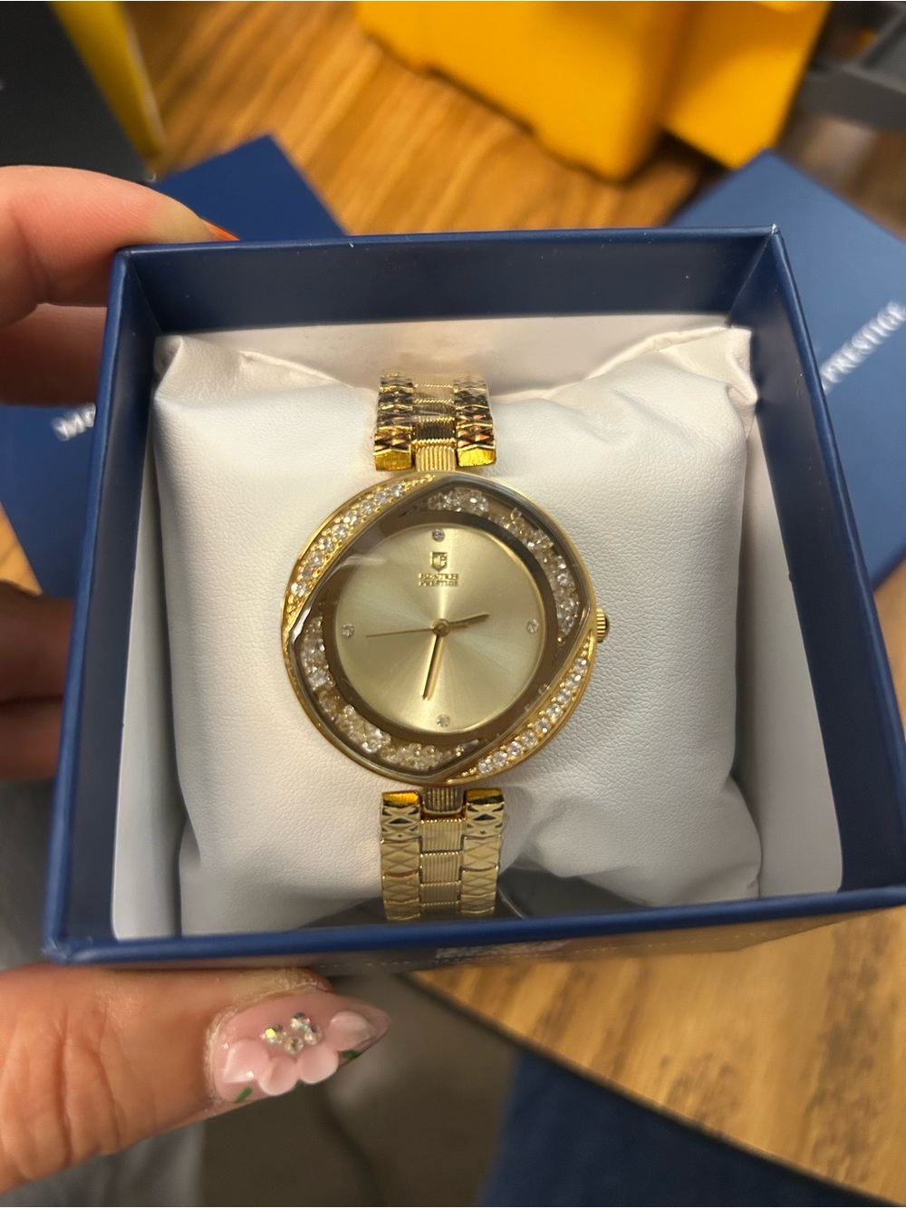 Montres Prestige by Invicta women’s gold watch with crystal embellishments